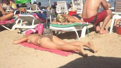 Sea woman ass Beaches lying down bikini sunbathing amateurs