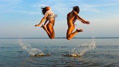 Sea woman jumping beach girls