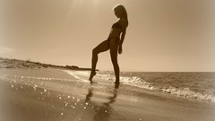 Sea woman sepia silhouettes low-angle shot
