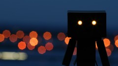 Silhouettes bokeh danboard glowing eyes