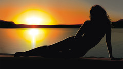 Silhouettes woman sunset