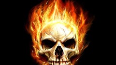 Skulls black background burning