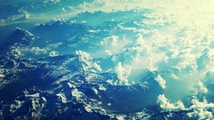 sky aerial view Mountains clouds snowy peak landscape