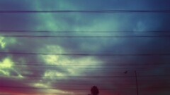 sky power lines clouds traffic lights outdoors