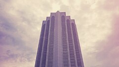 skyscraper Islamic architecture purple pink building clouds