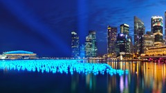 Skyscrapers panorama Singapore City Lights reflections glowing 
