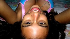 Smiling black eyes huge boobs