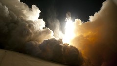 Smoke night sky space shuttle