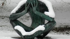 Snow despair sculptures hands on head