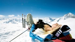 Snow hills woman Skiing blondes lying down boobs tux
