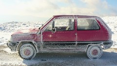 Snow ice cars Fiat side view red cars Fiat Uno