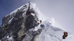 Snow mountaineers mountain peak