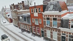 Snow street houses The Netherlands