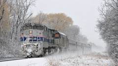 Snow trains railroad tracks