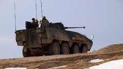 Snow War soldiers patrol tanks NATO Afghanistan apc Polish 