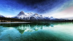 Snow water Mountains lakes skies