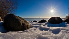 Snow winter rocks sunlight