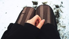 Snow winter woman hands legs pantyhose body parts