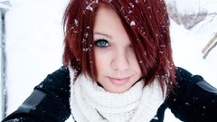 Snow woman close-up faces redheads