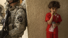 Soldiers bubbles children