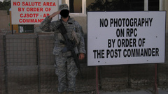 Soldiers Guns signs