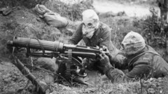 Soldiers machine gun gas