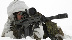 Soldiers snow military weapons