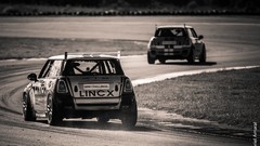 Sports track turn Speed races sports cars Mini Cooper racing 