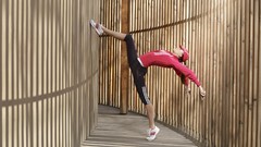 Sports woman Gymnast arms raised