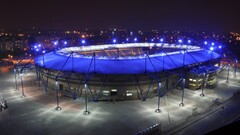 stadium night sky cityscape