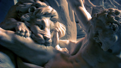 Statues Lions bite Men