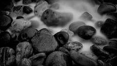 Stones black and white wet