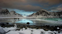 Stones Mountains clouds sky ocean cold coast gloomy