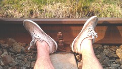 Stones nature grass feet boots railway railroad tracks