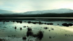 Stones snow Mountains reflections ponds