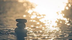 Stones water bokeh sunlight