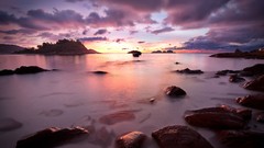 Stones water clouds sunlight