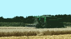 Summer agriculture farming John Deere harvester