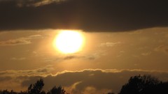 Sun clouds silhouettes skyscapes