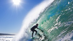 Sun waves surfing male