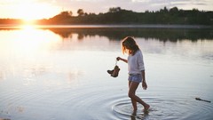 Sun woman lakes reflections