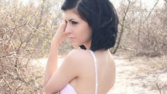 Sun woman Pierced bokeh black hair Neon Lynxie