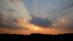 sunlight clouds sky dark outdoors