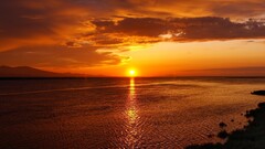 sunlight sky clouds sun water