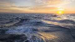 Sunrise golden sky ocean