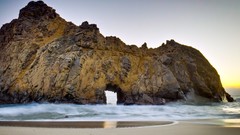 Sunrise sand ocean rocks Beaches