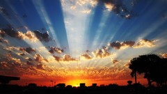 Sunrise sun clouds cities skies