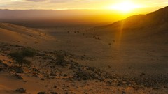 Sunrise sun clouds Sahara skies