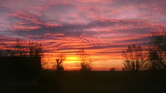 Sunrise sunset sun clouds light skies