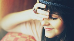 Sunrise woman sunlight closed eyes brunettes hands on face